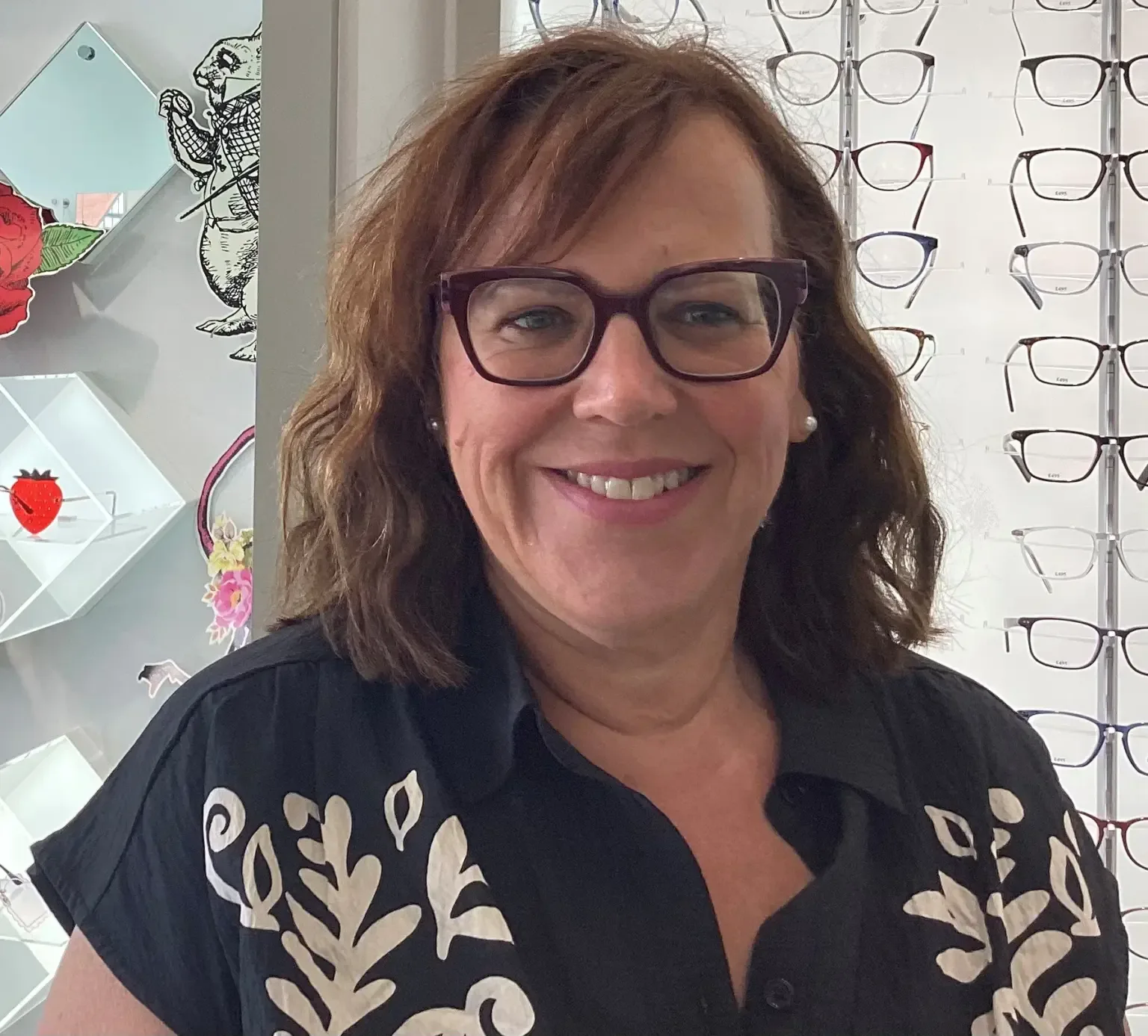 Happy Eyewise client wearing glasses, photo 7