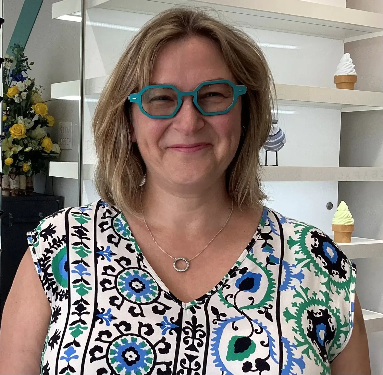 Happy Eyewise client wearing glasses, photo 1